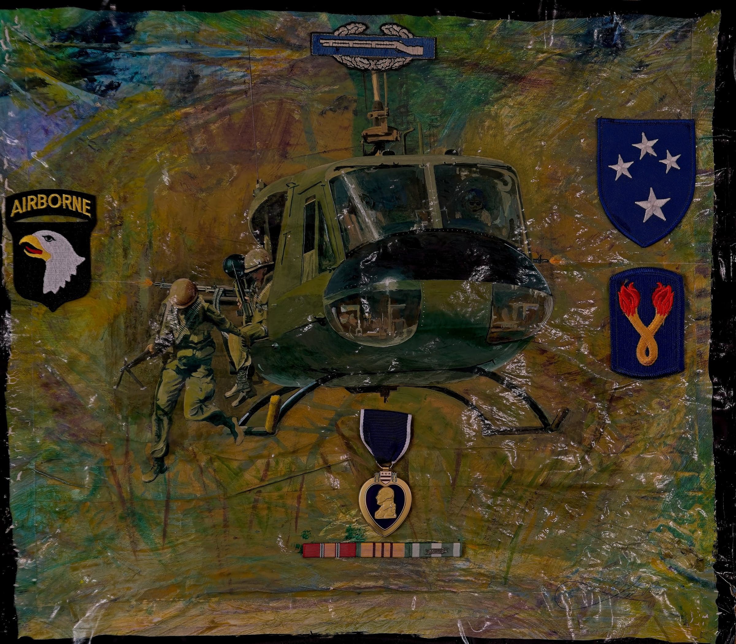 John Benscoter's mixed-media Vietnam tribute — a UH-1 helicopter with 101st Airborne insignia and a Purple Heart